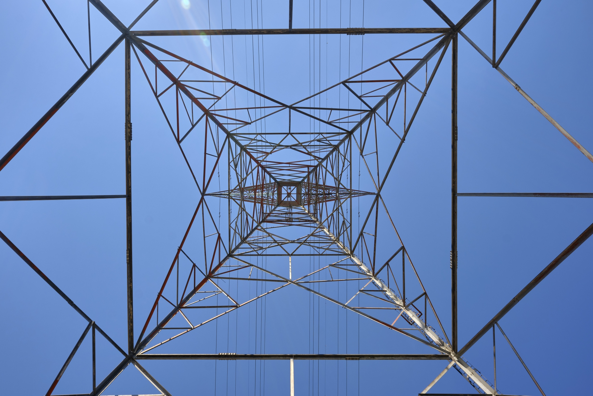Transmission tower in Ontario, Canada from under up.