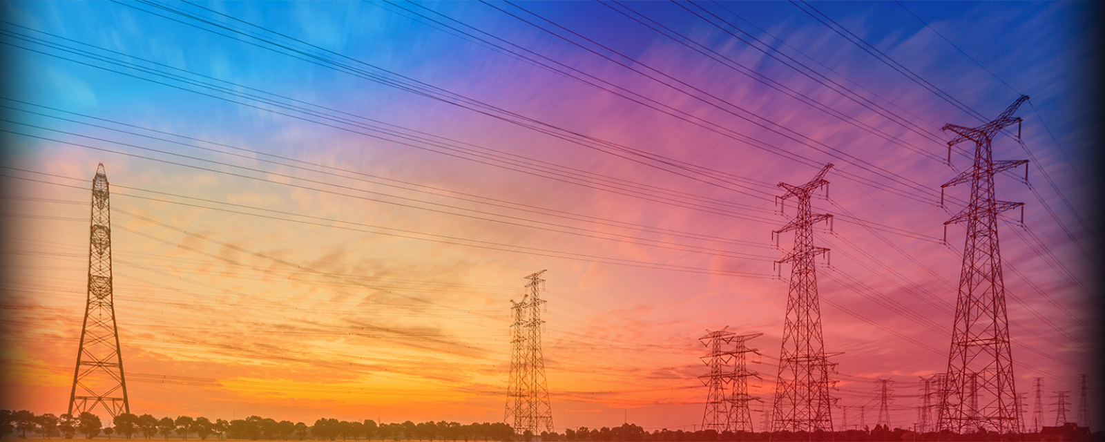 transmission towers at dusk